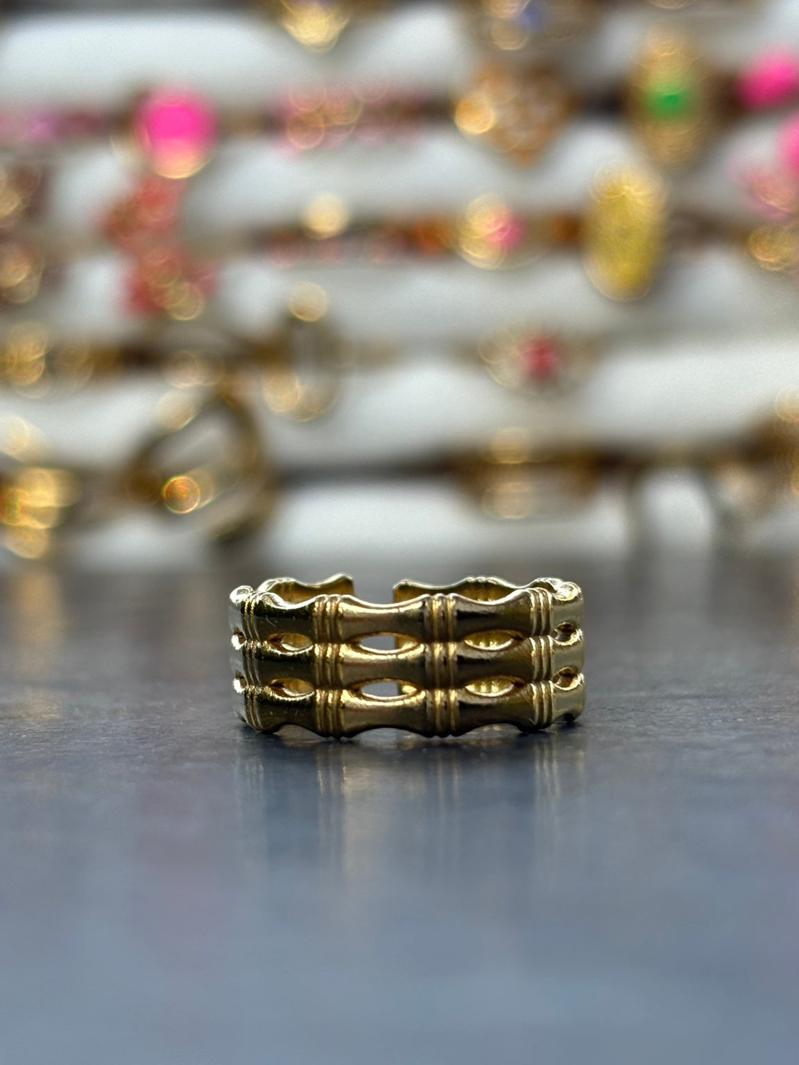 Bague dorée ajustable triple rang texturé