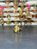 Bague dorée ajustable médaillon soleil